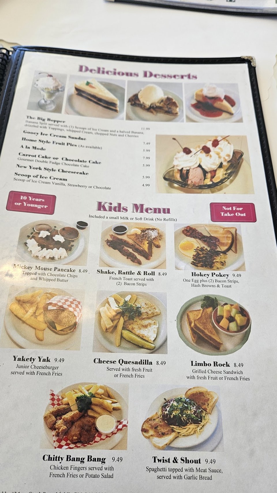 Diner menu featuring eggs, fries, and cheesecakes.
